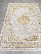 Однотонный ковер DELINA A064A CREAM / GOLD FDY